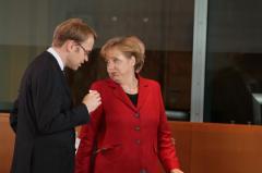 Jens Weidmann e Angela Merkel