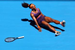 serena williams falls down during a first round match at the australian open
