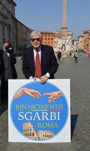 vittorio sgarbi con il simbolo di rinascimento roma foto di bacco (1)