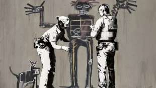 BANKSQUIAT. BOY AND DOG IN STOP AND SEARCH di BANKSY