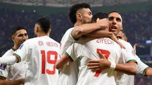 esultanza giocatori del marocco dopo la vittoria sul belgio